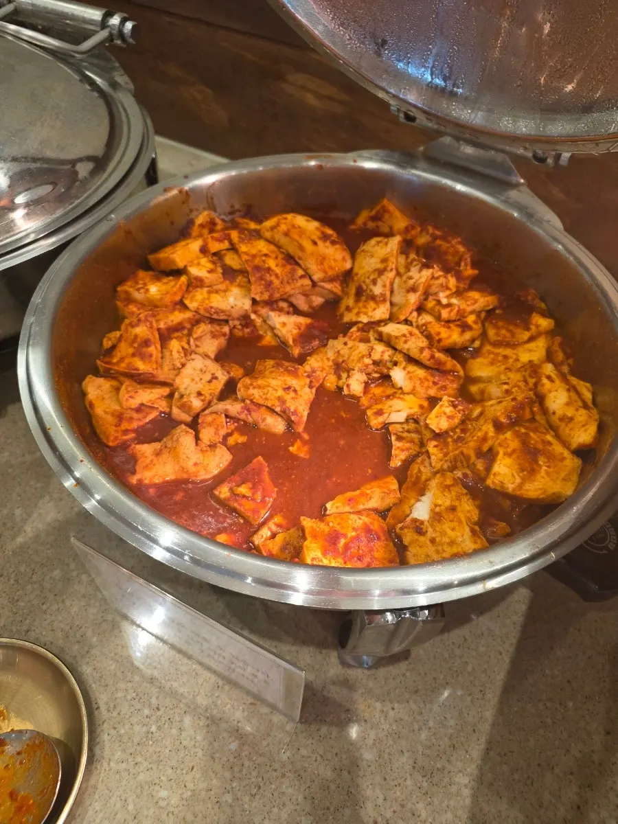 A variety of namul side dishes laid out at the self-bar