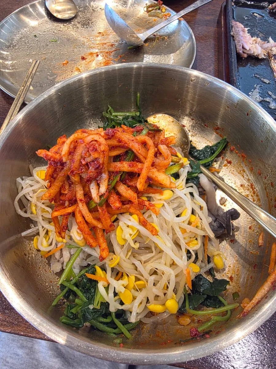 An emptied bowl of barley rice