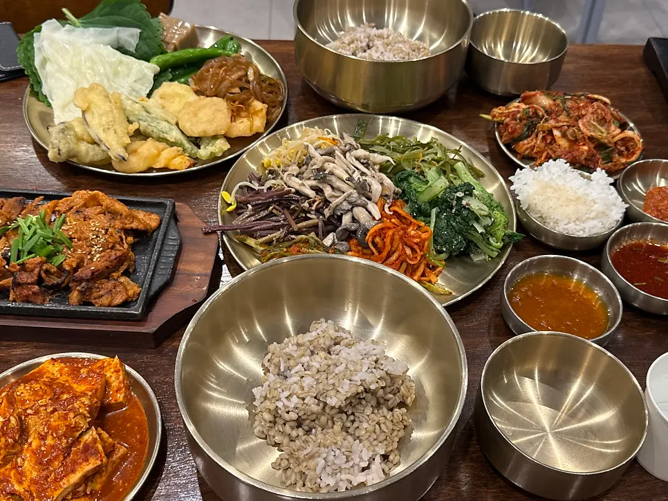Sesame oil and gochujang containers on the table