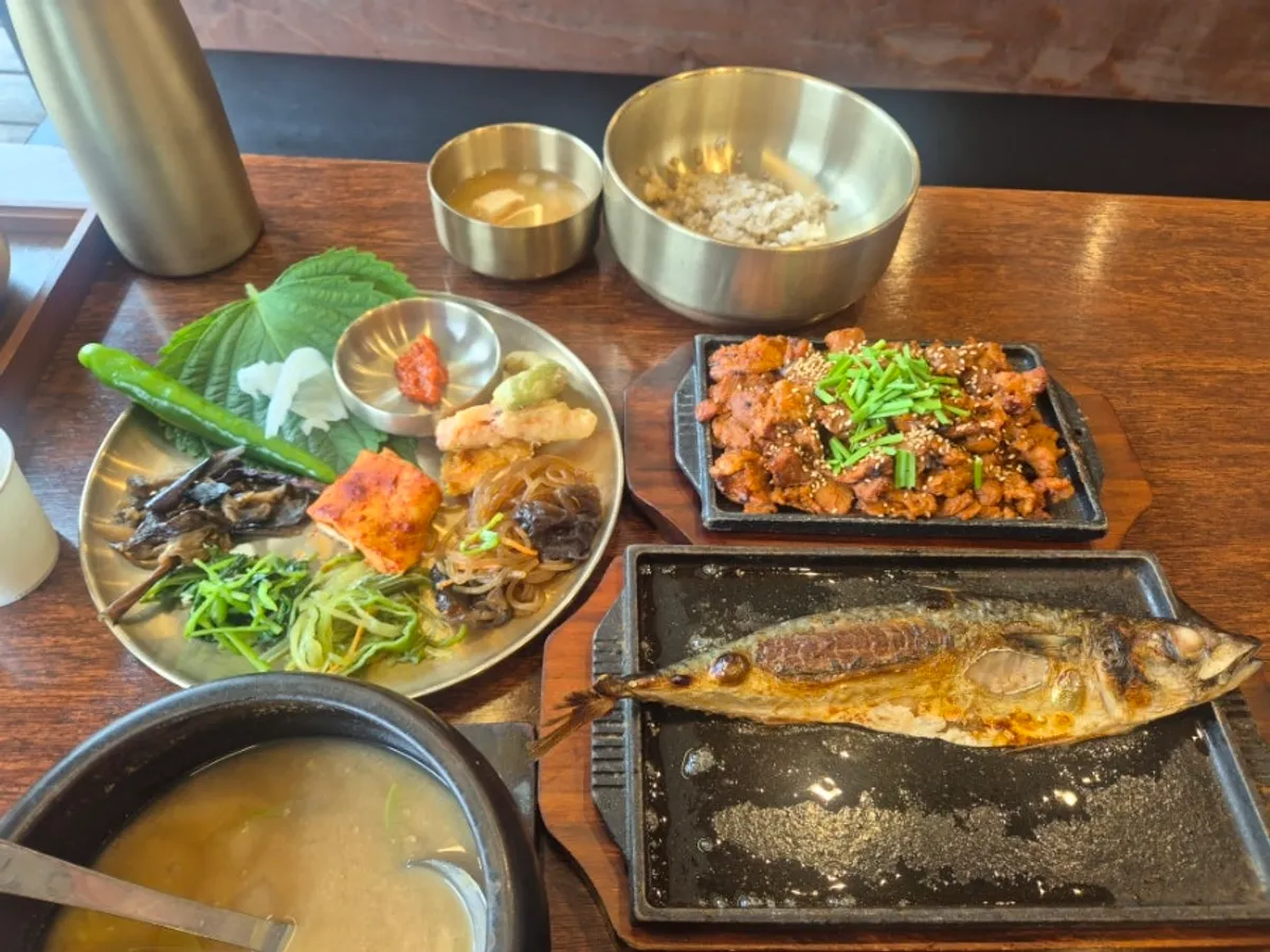 A plate of namul banchan loaded from the self-serve bar