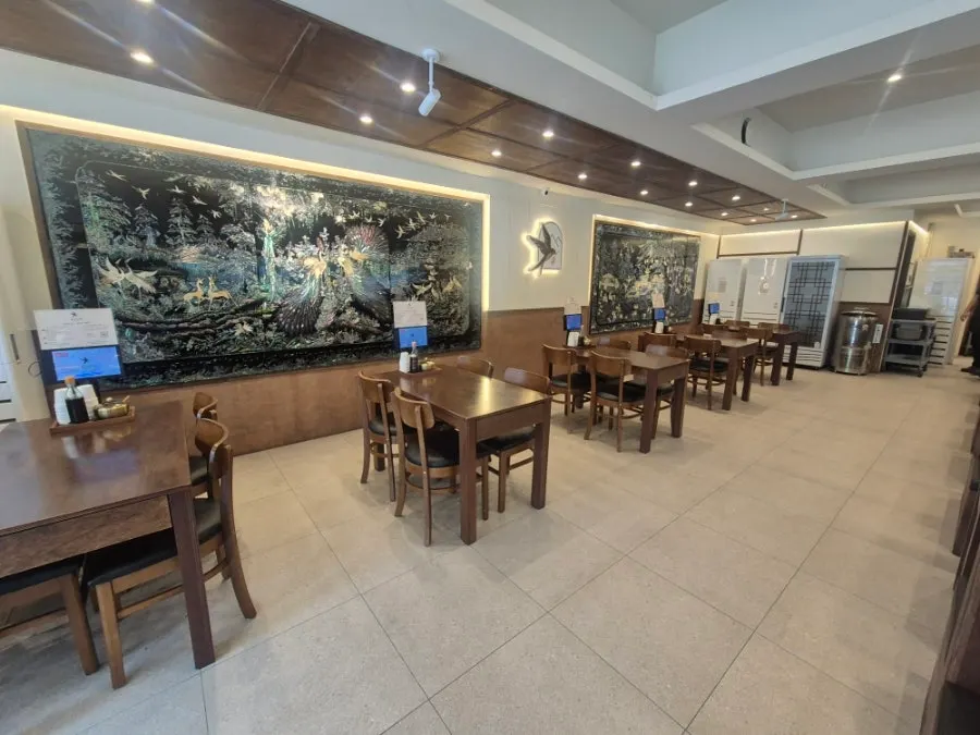The spacious four-person seating inside Boriook Main Branch