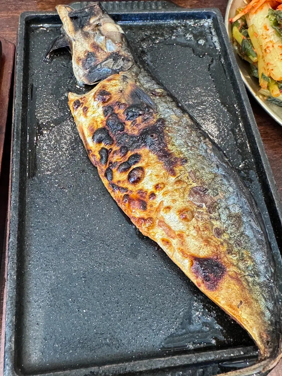Grilled mackerel served as a half portion
