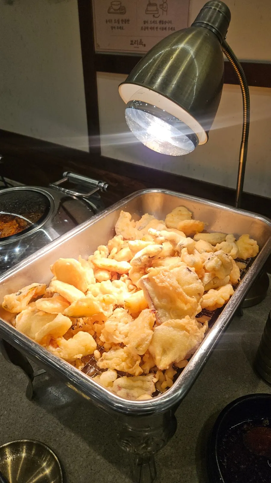 Namul dishes laid out at the self-serve bar