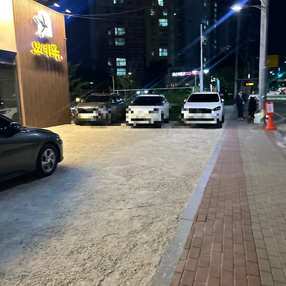 Exterior of Boriook Main Branch and parking area
