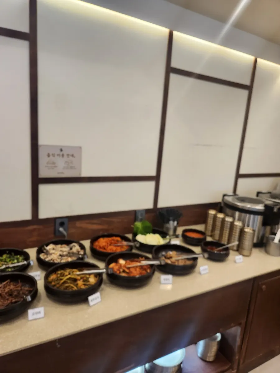 Self-serve corner at Boriook Main Branch with many side dishes