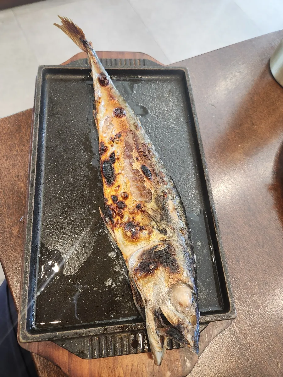 A meat dish served on a griddle