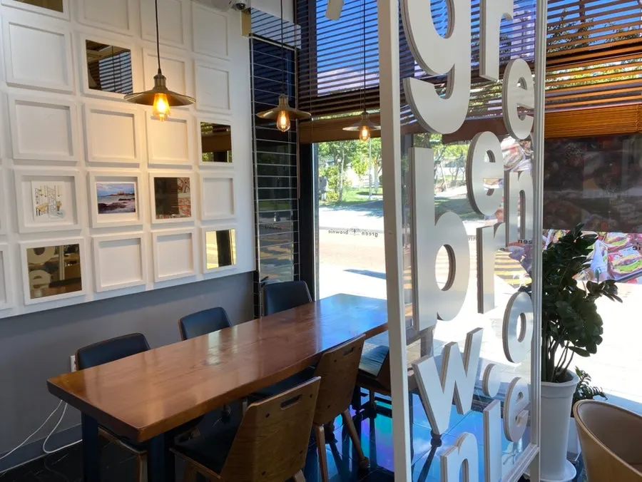 Spacious café interior table seating