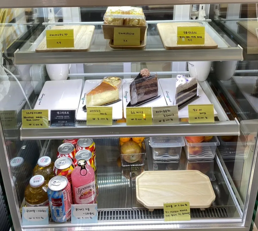 Display case with cakes and desserts