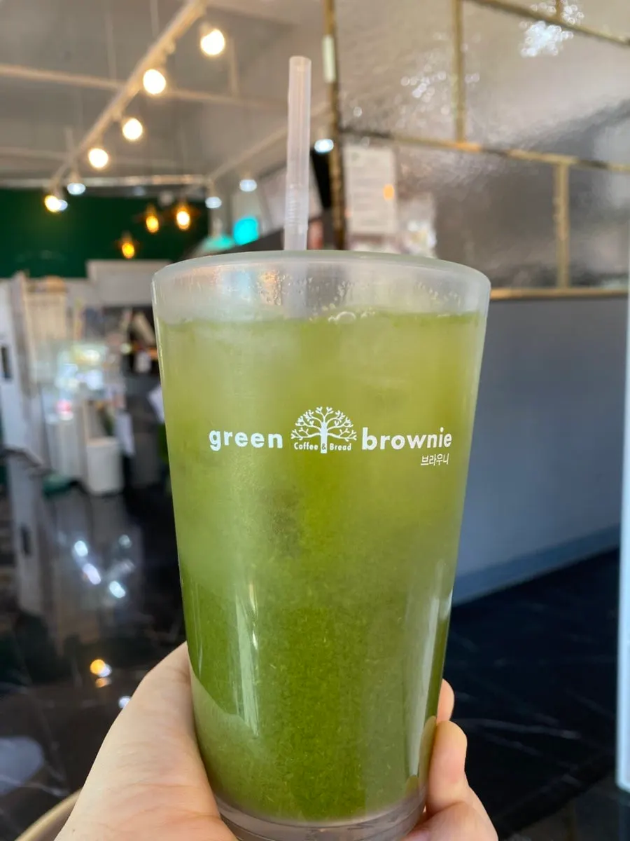 A glass of well-being juice on the table