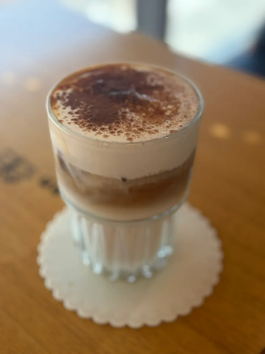 Cream latte with a thick, chewy cream layer on top