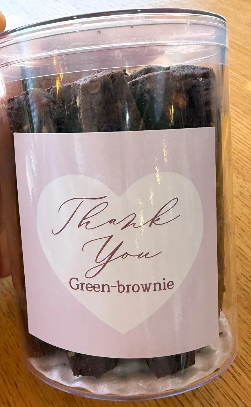 Packaged baton chocolat cookie with a sticker