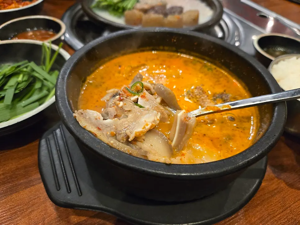 A spoonful of sundae and offal lifted from the bowl