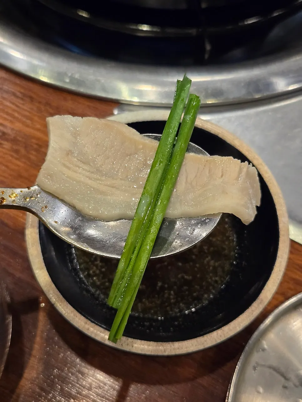 Plate of pork jowl boiled meat served with the set meal