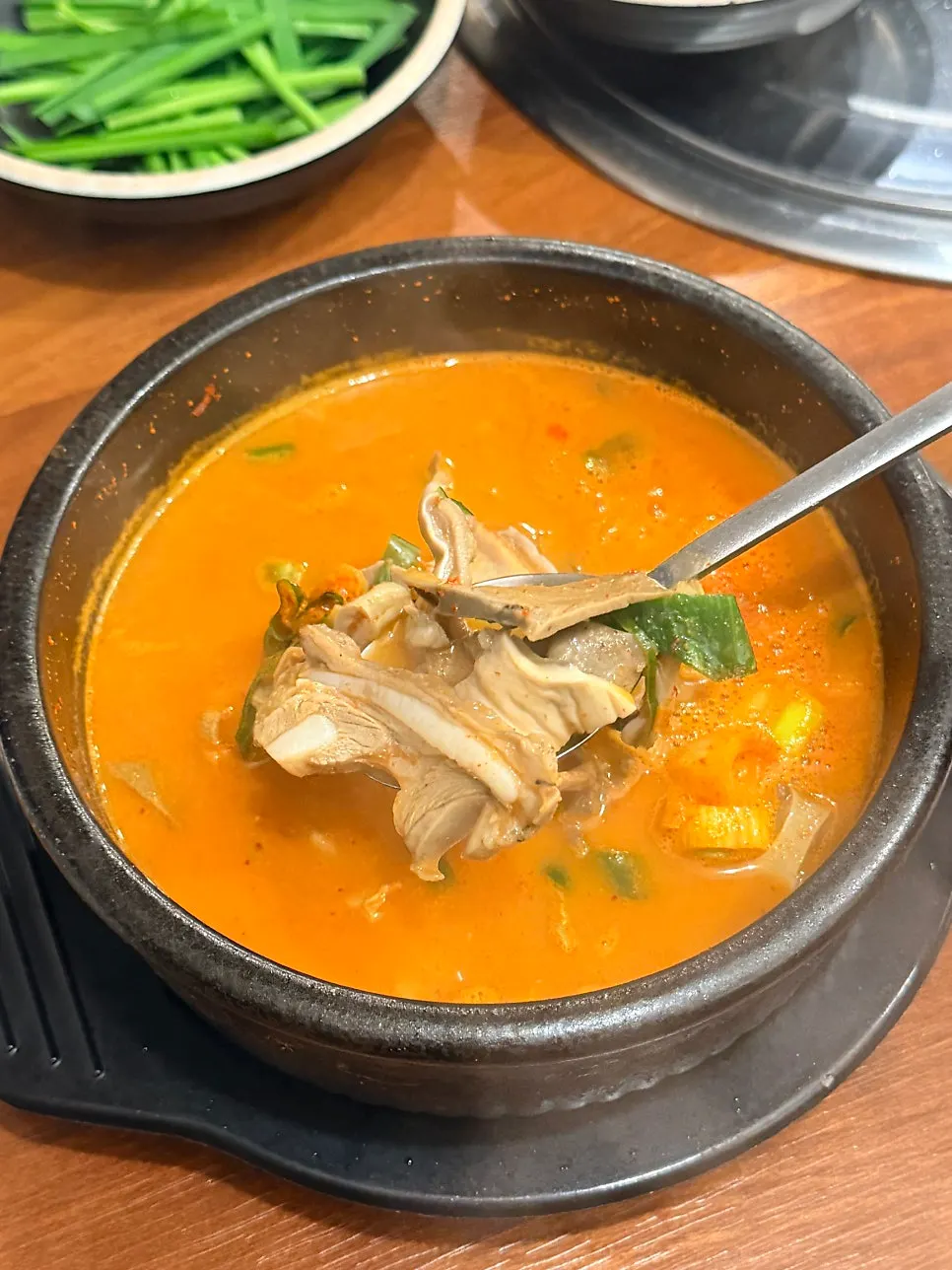Close-up of the red broth in the spicy intestine gukbap