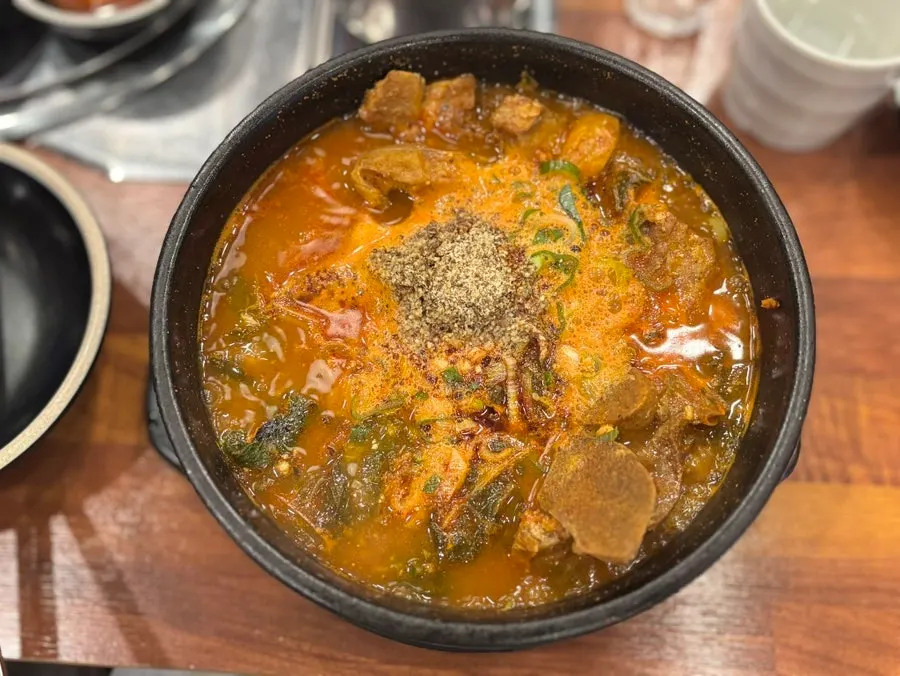 Pork bone hangover soup filled with napa cabbage and big bones