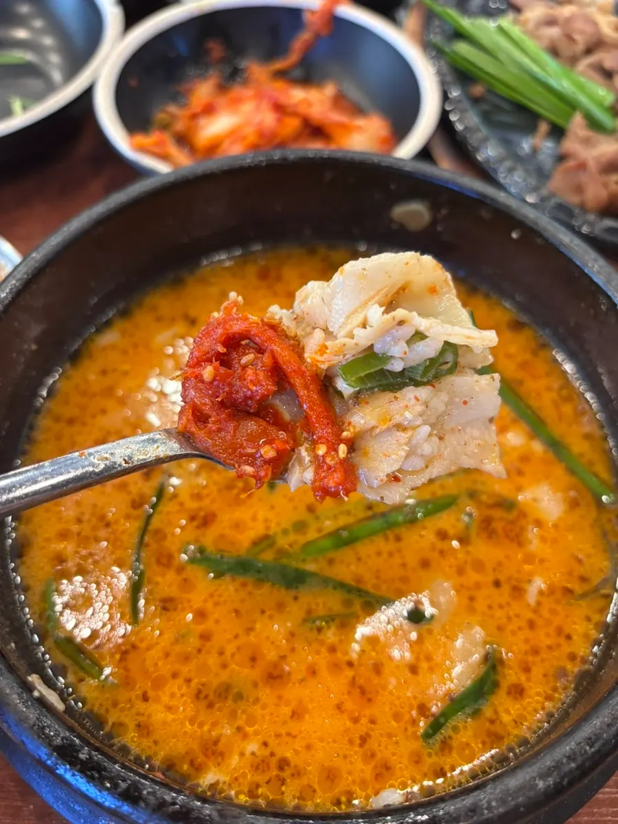 Eating pork gukbap together with pollack sashimi salad