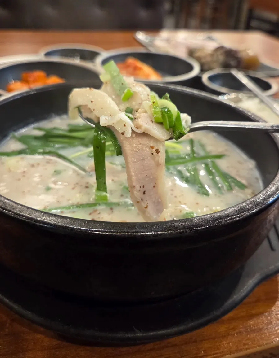 Pork-neck gukbap loaded generously with pork neck