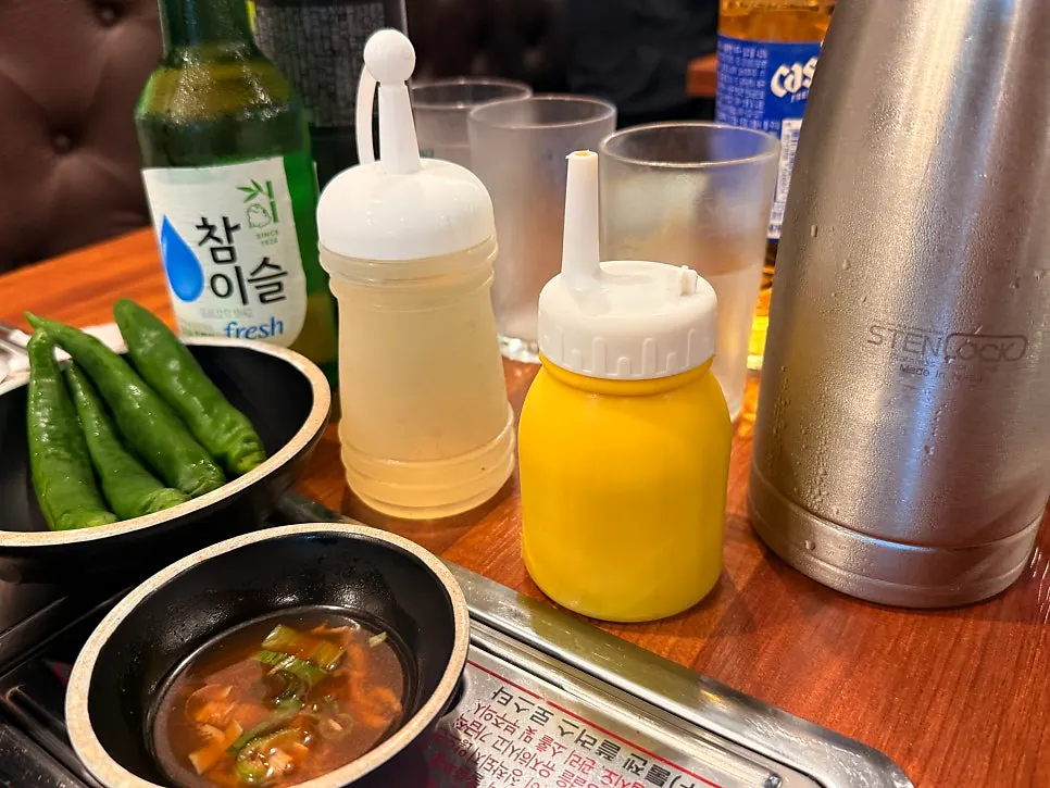 Mul-naengmyeon topped with egg and cucumber