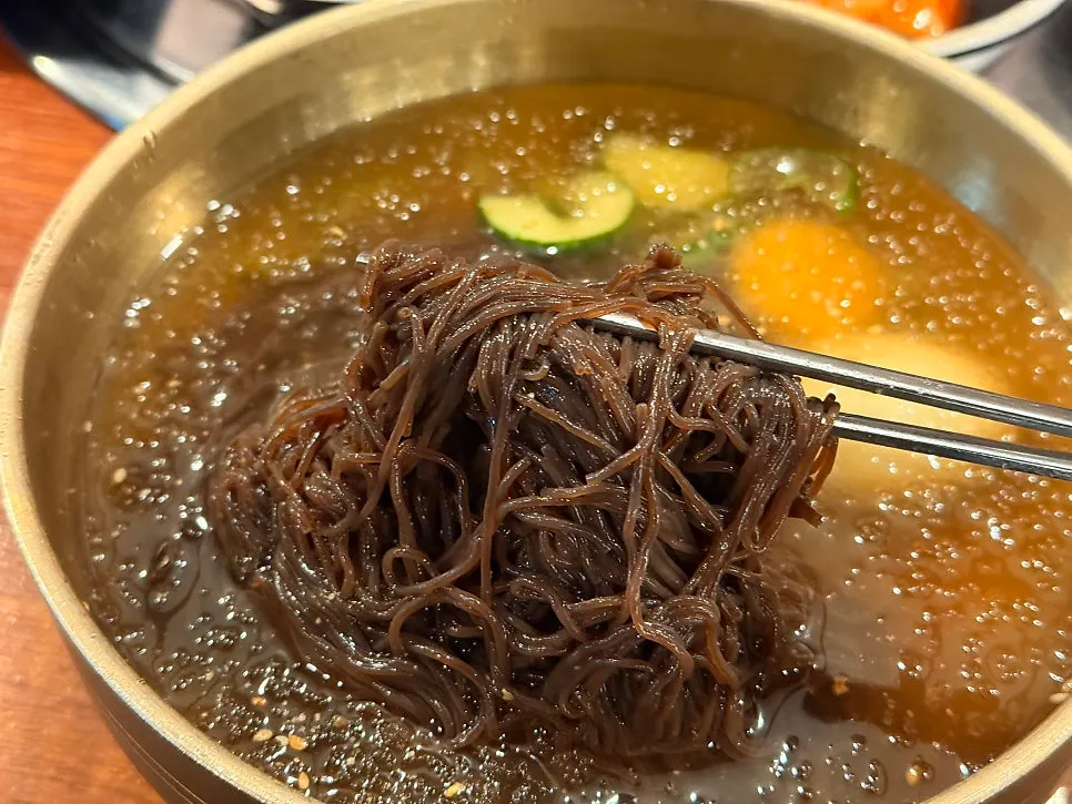 Mustard, vinegar, and chili paste served with the naengmyeon