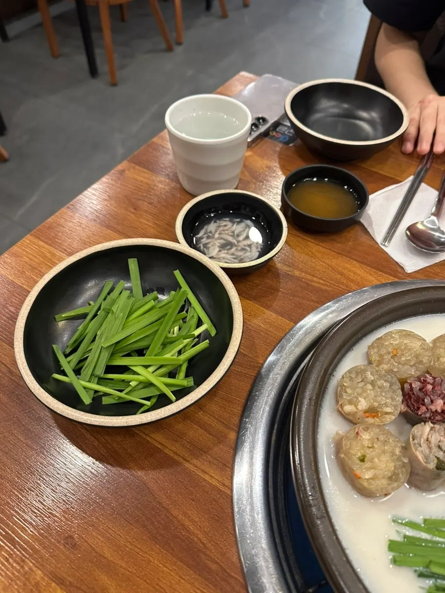 A plate of fresh geotjeori-style napa cabbage kimchi