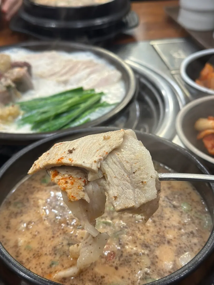 Broth with dadegi chili seasoning and perilla seed powder mixed in