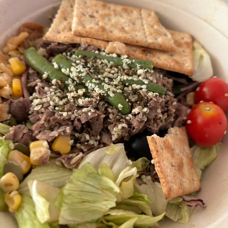 Salad bowl with vegetables, corn and nuts