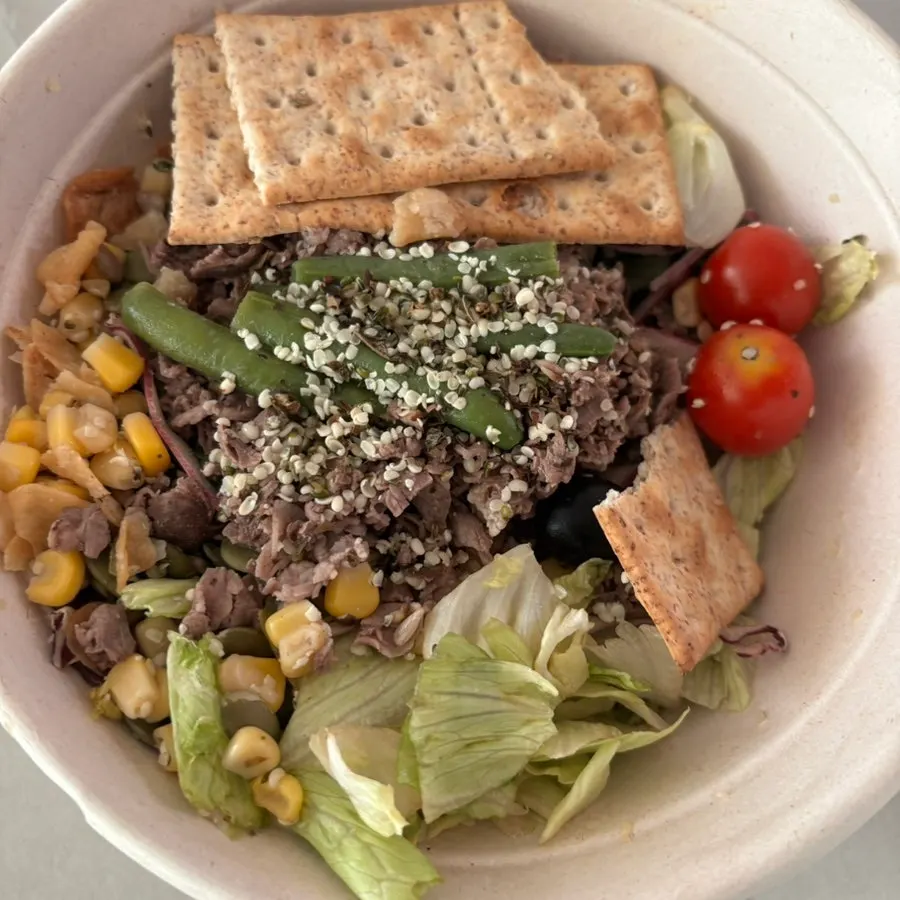Beef and vegetables inside the beef garlic salad bowl