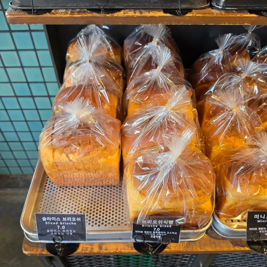 Shelf with basic breads on display