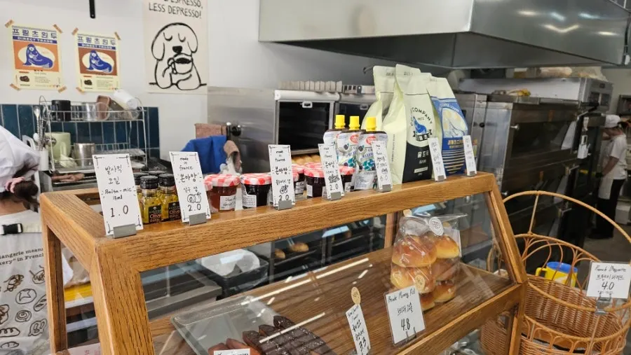 Bread display shelves at Boulangerie Tan