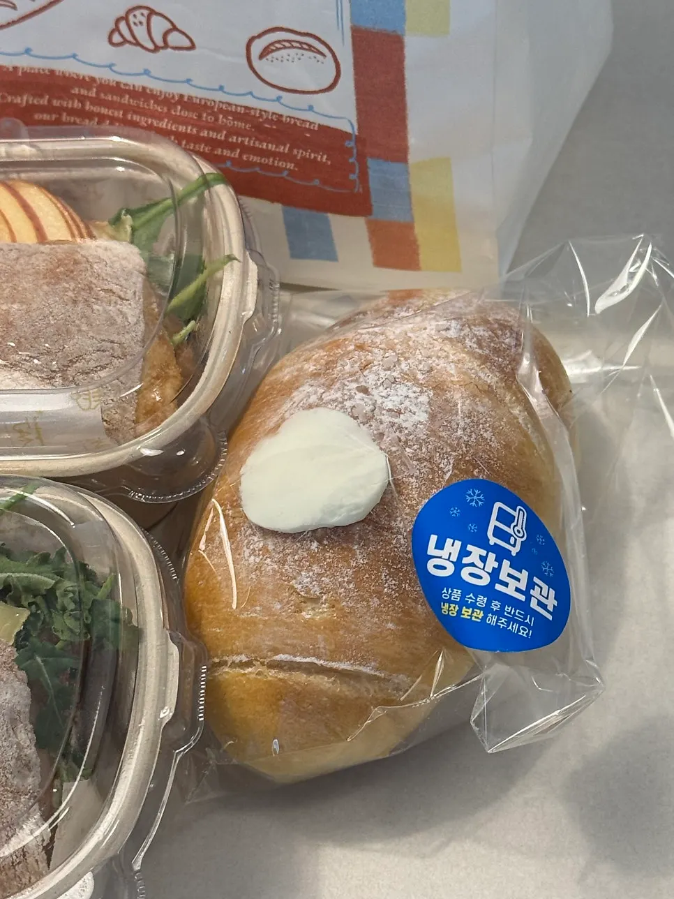 A bitten-into ciabatta sandwich