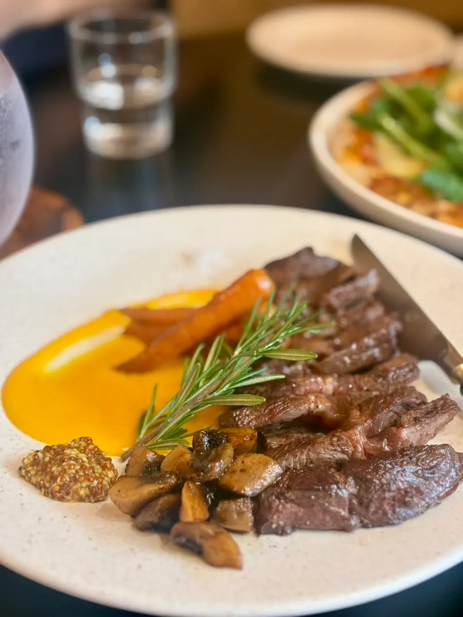 A plate of sous vide beef flap steak