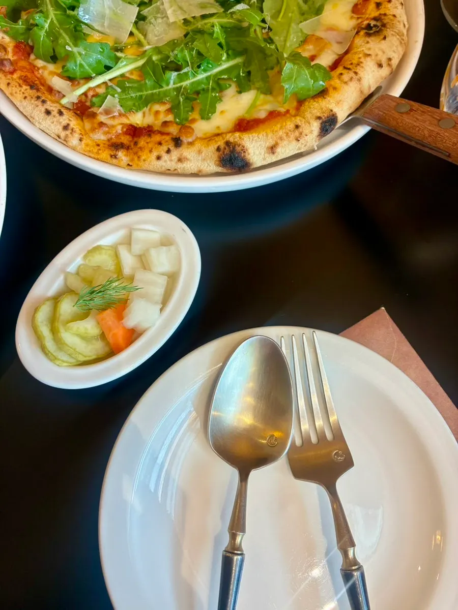 Triple cheese arugula pizza