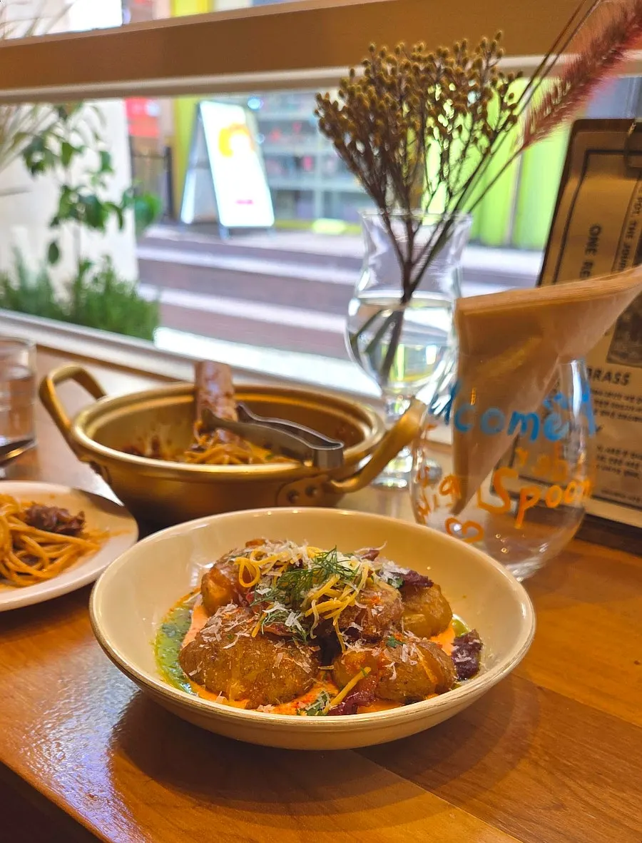 Noodles twirled around a fork from the galbi pasta