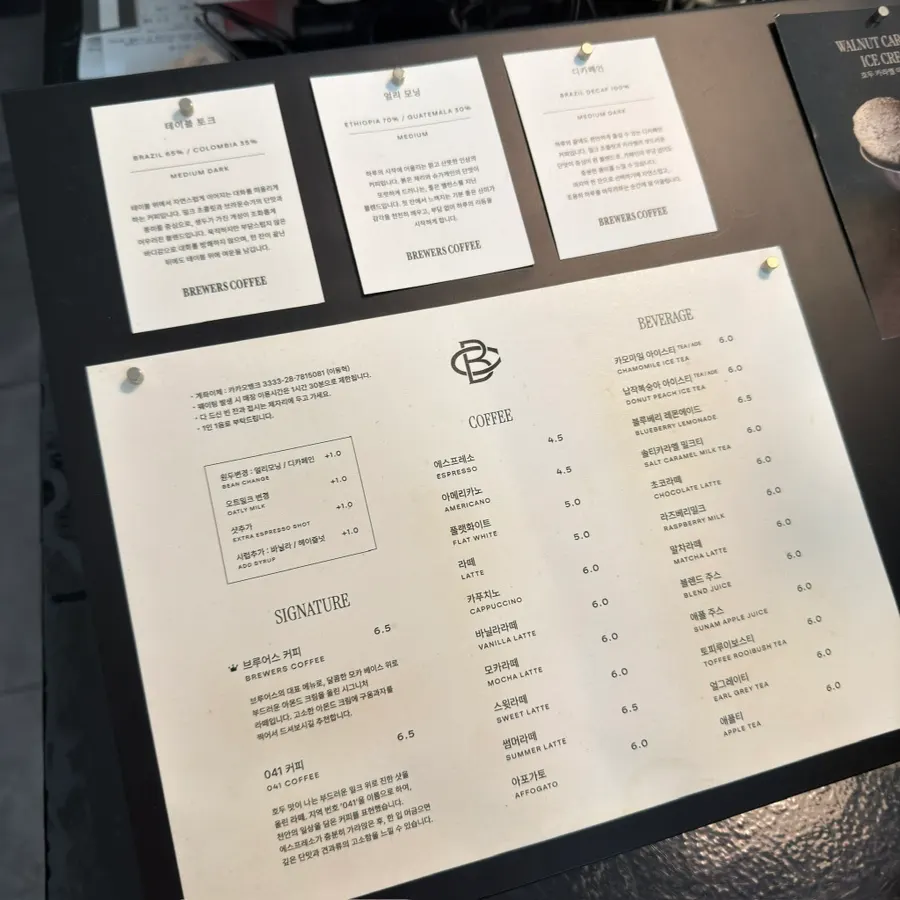 Order counter and dessert display at Brewers Coffee