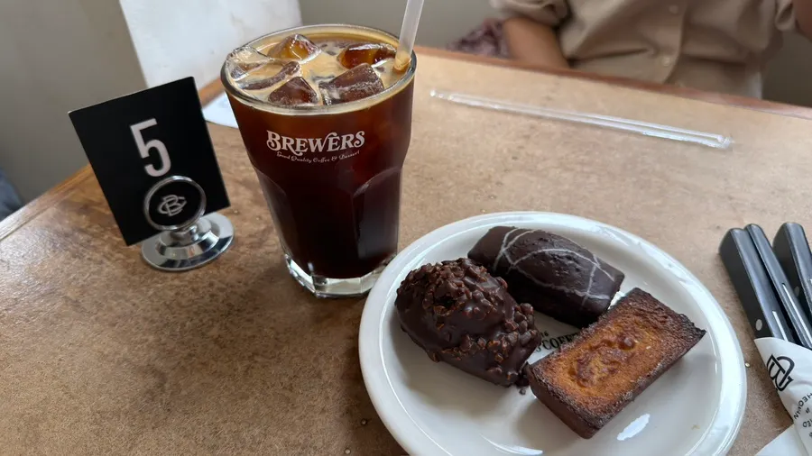 Americano and baked pastries ordered at Brewers Coffee