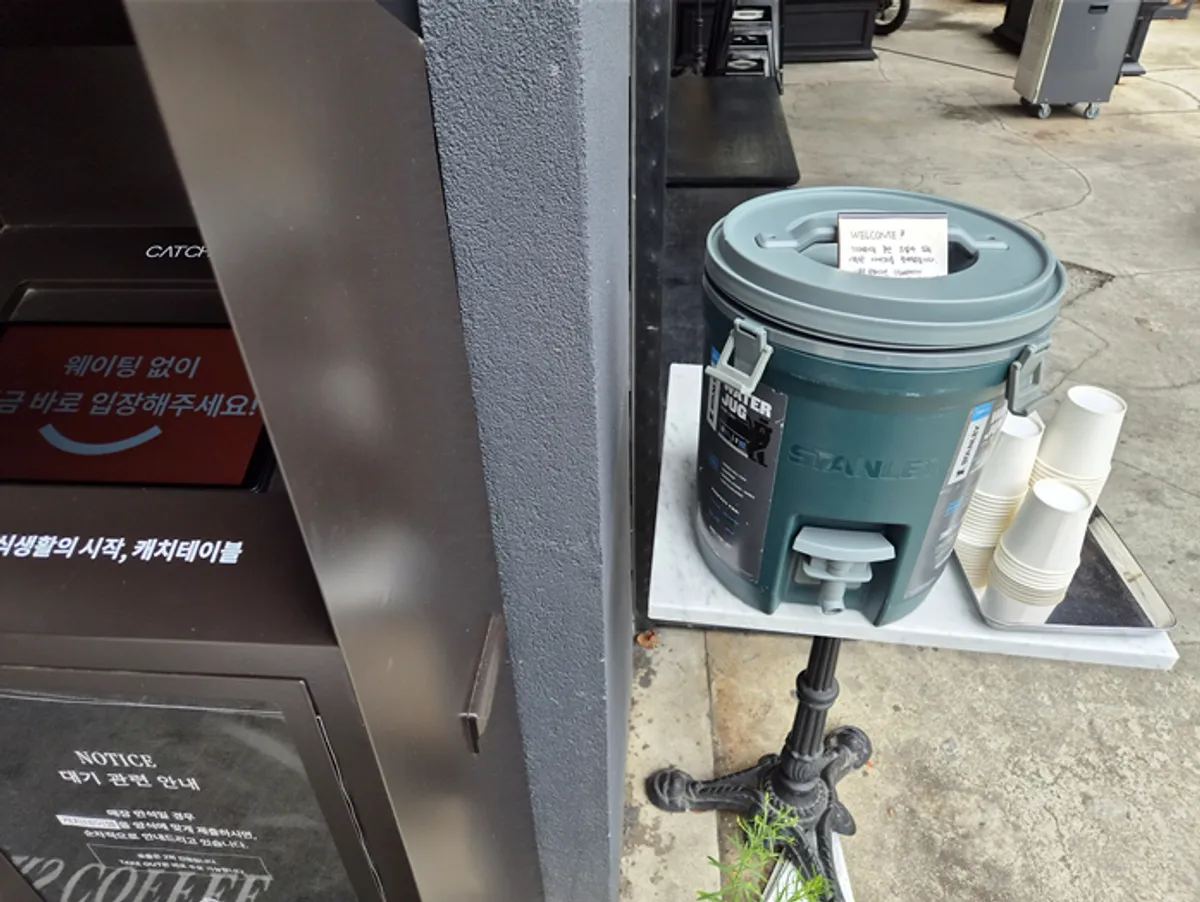 Brewers Coffee's outdoor terrace and photo booth in front of the store