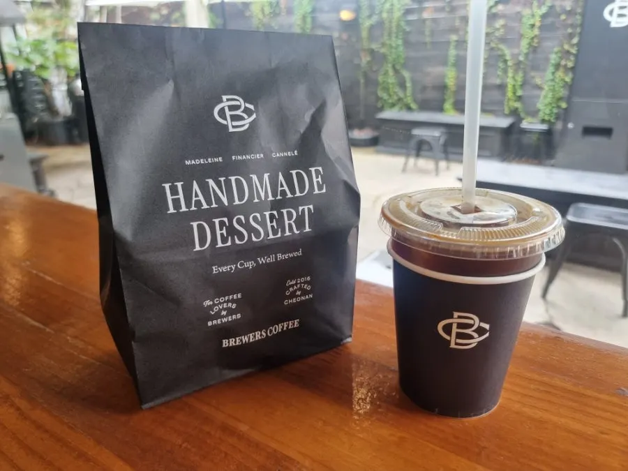 Individually wrapped baked goods in a takeout bag