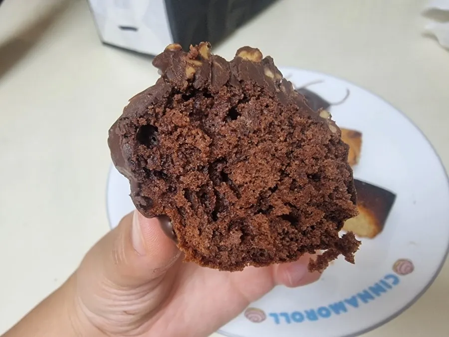 Cross-section of almond choco madeleine cut in half