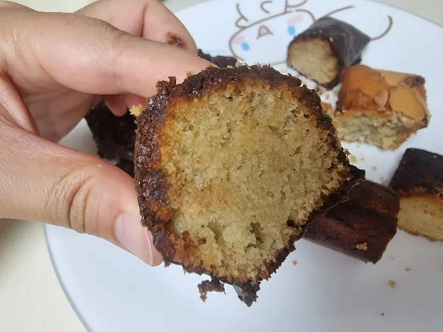 Cross-section of salted choco financier cut in half
