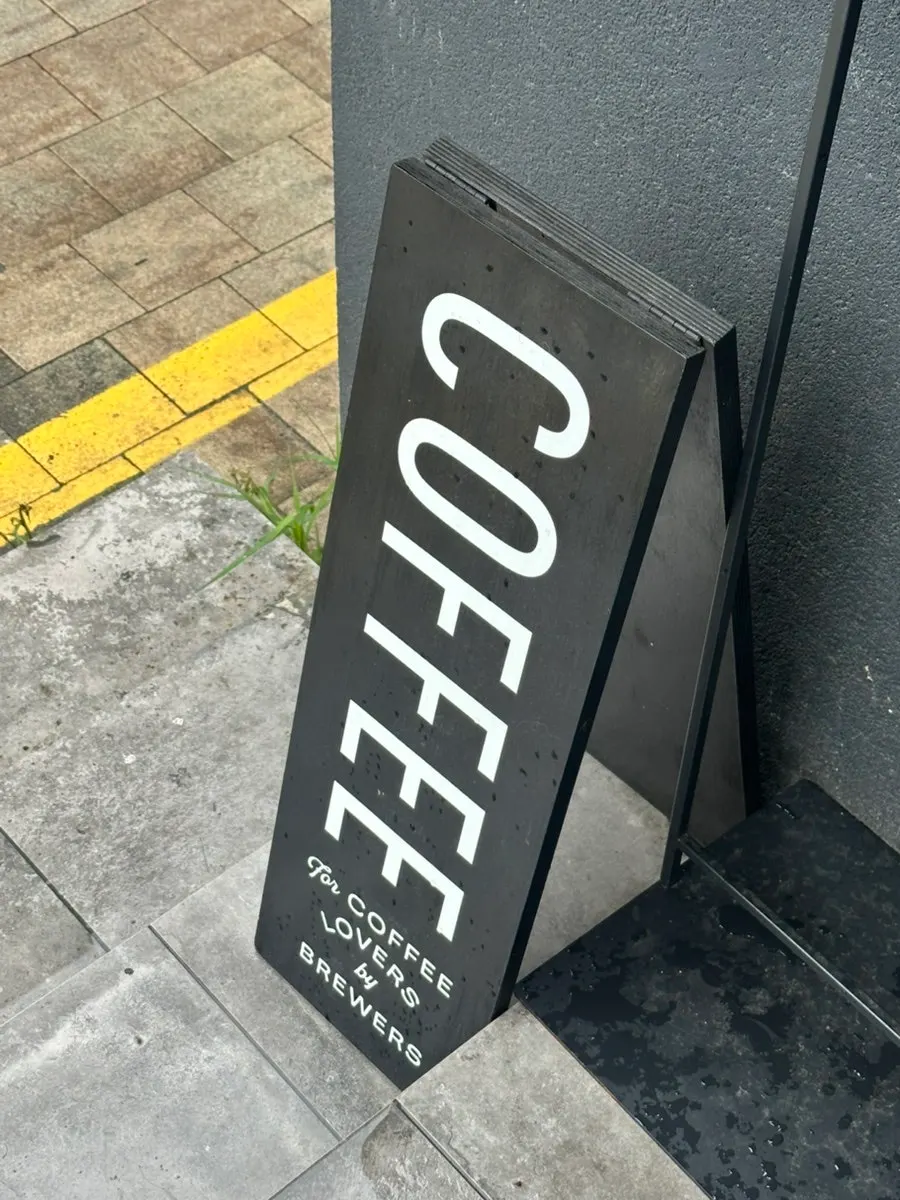 Entrance and sign of Brewers Coffee