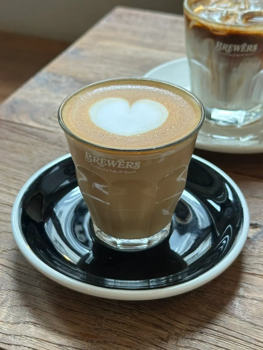 A cup of hot flat white