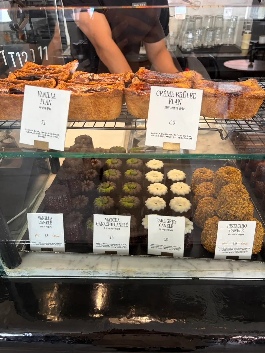 Display of baked goods including Dubai chocolate financier