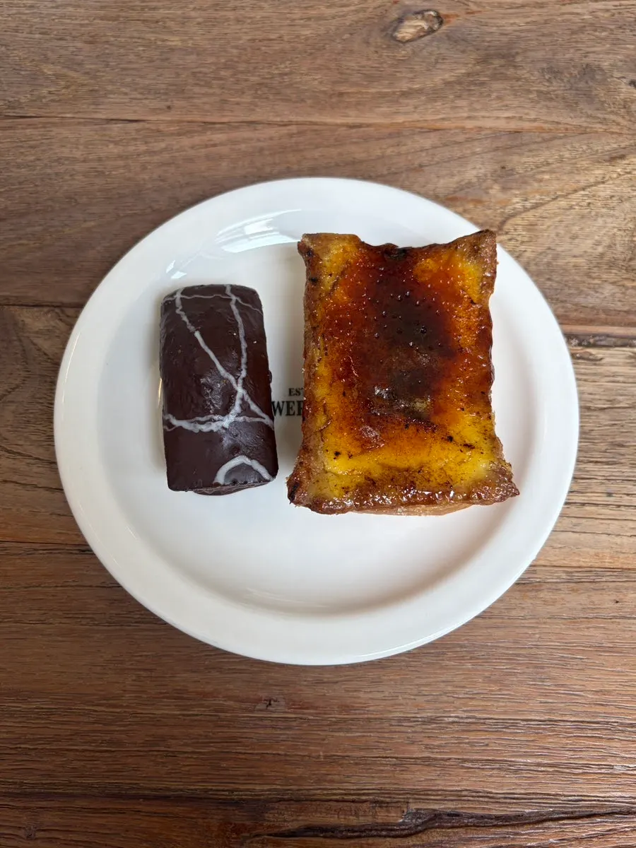 Plate with cream brûlée flan and Dubai chocolate financier