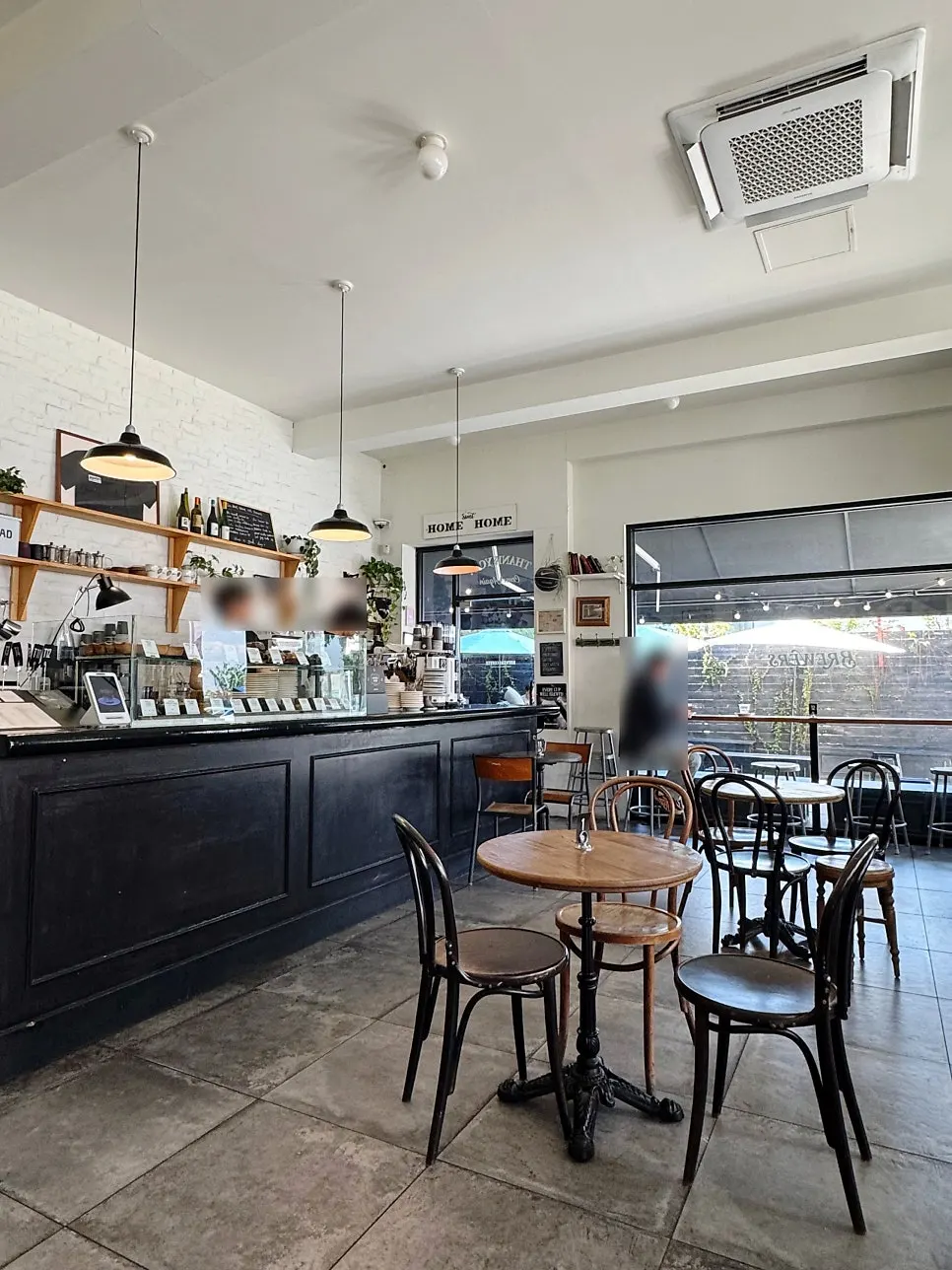 Café interior in wood and black tones