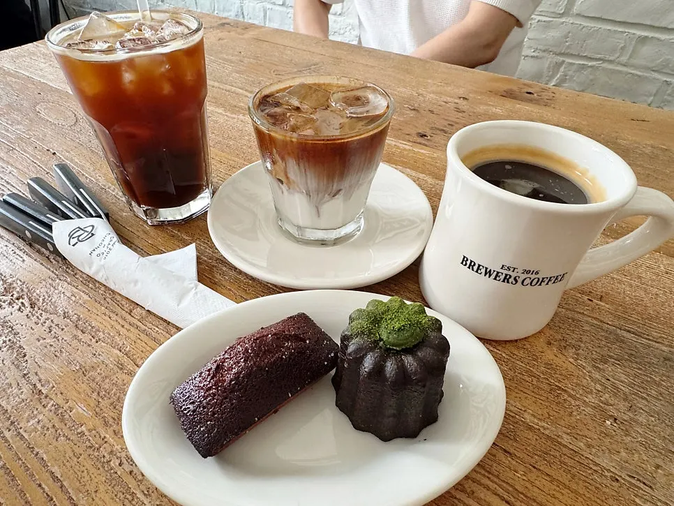Coffee and baked goods order laid out on the table