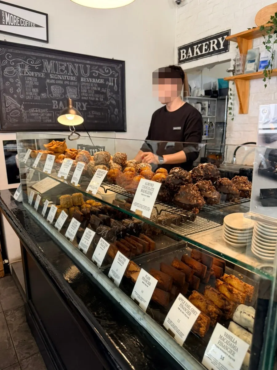 Baked goods displayed on the shelf at Brewers Coffee