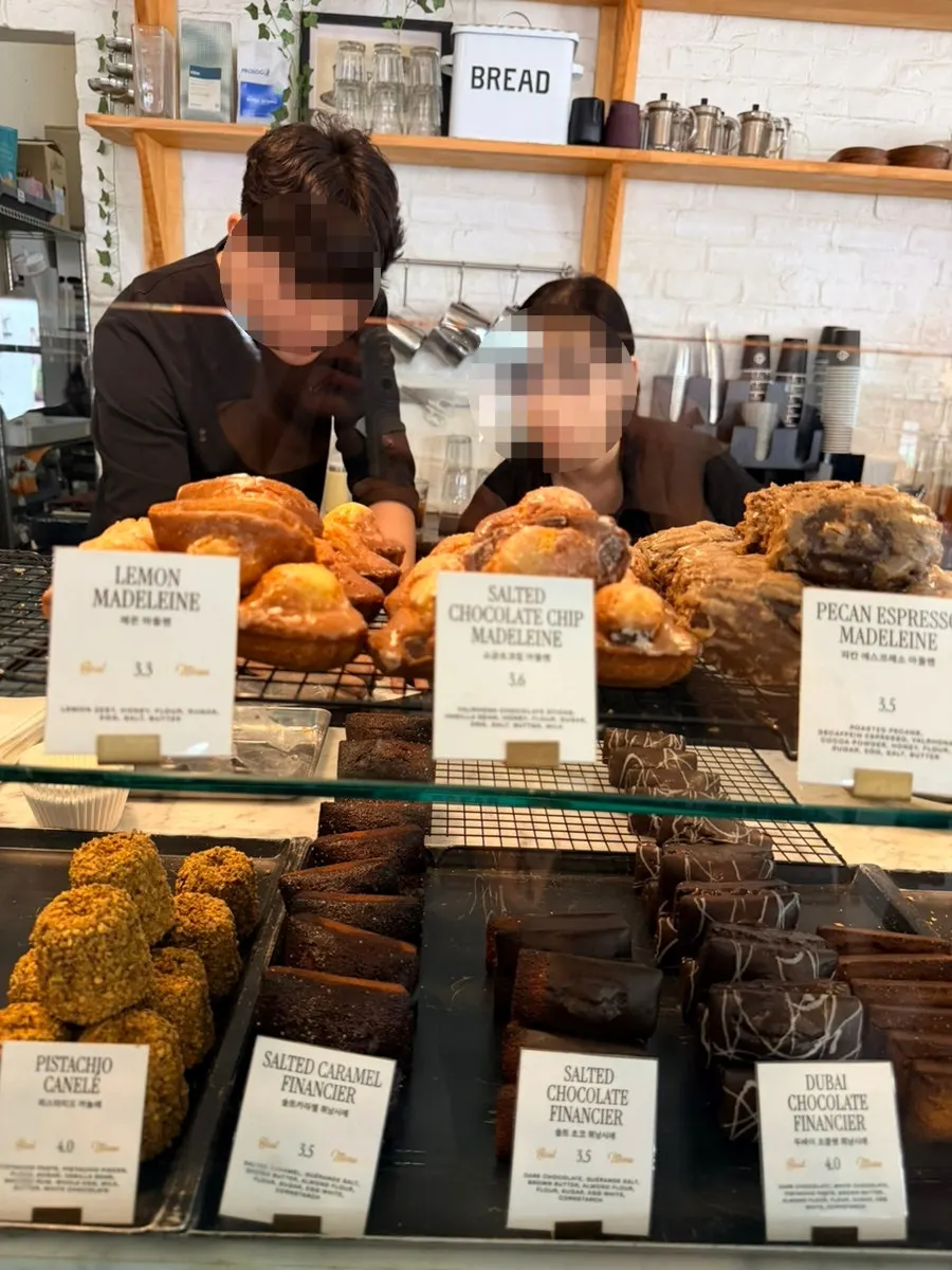 Madeleines and financiers in the dessert showcase