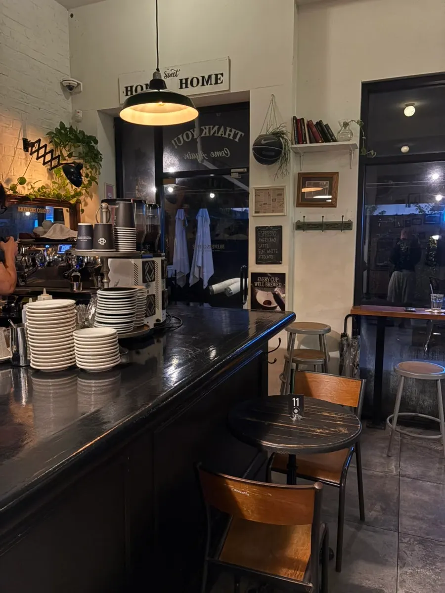 Spacious, atmospheric indoor seating at Brewers Coffee