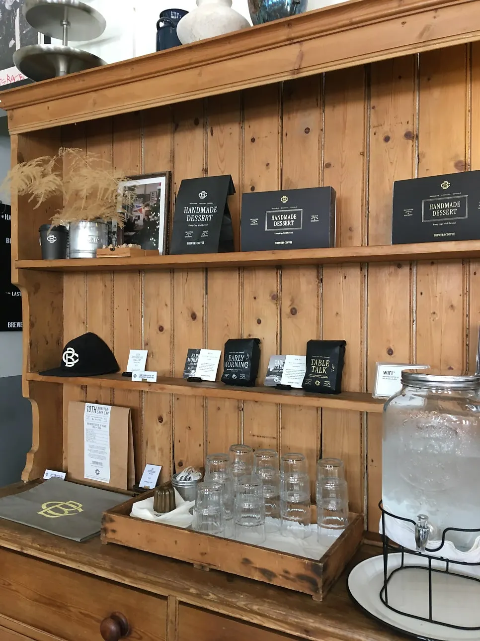 Shelf with coffee beans and bottled water