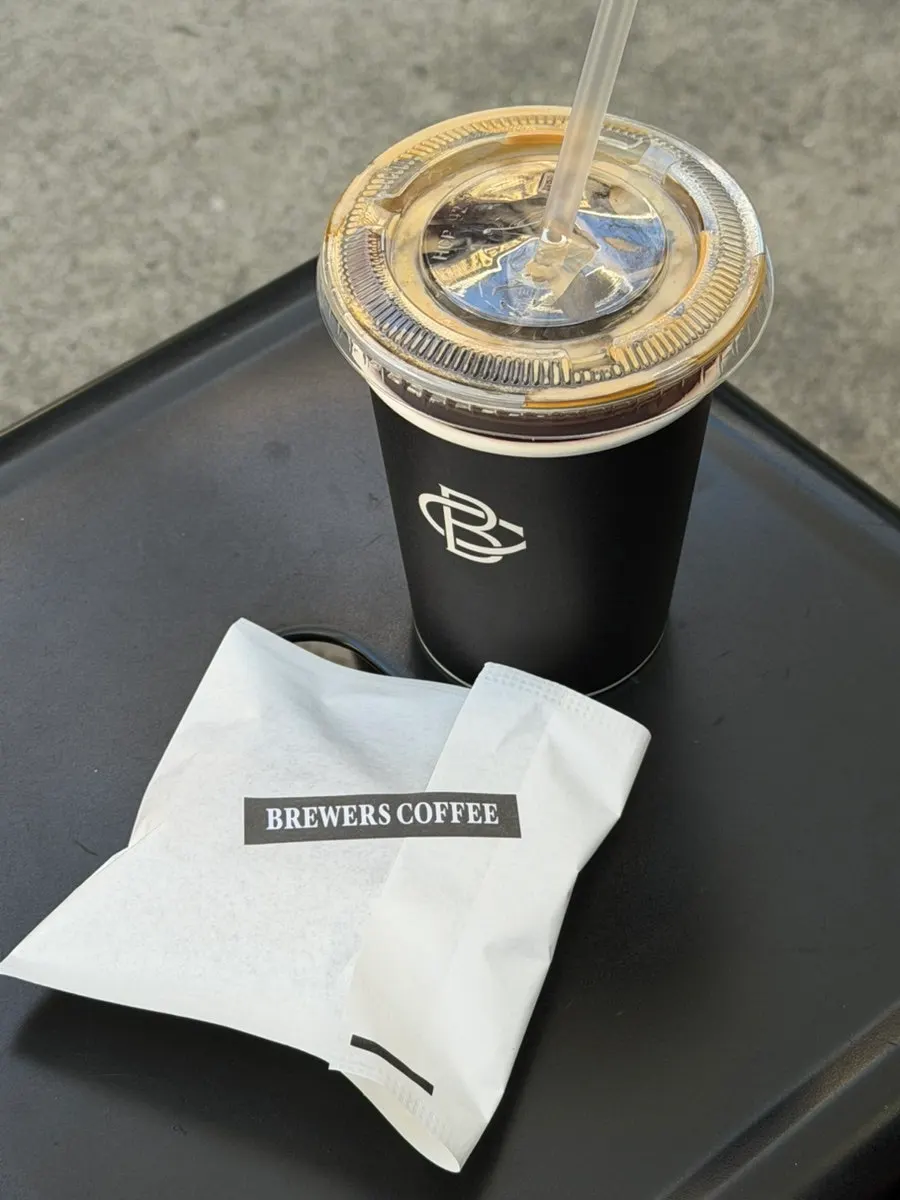 Americanos with a salted chocolate financier and crème brûlée flan